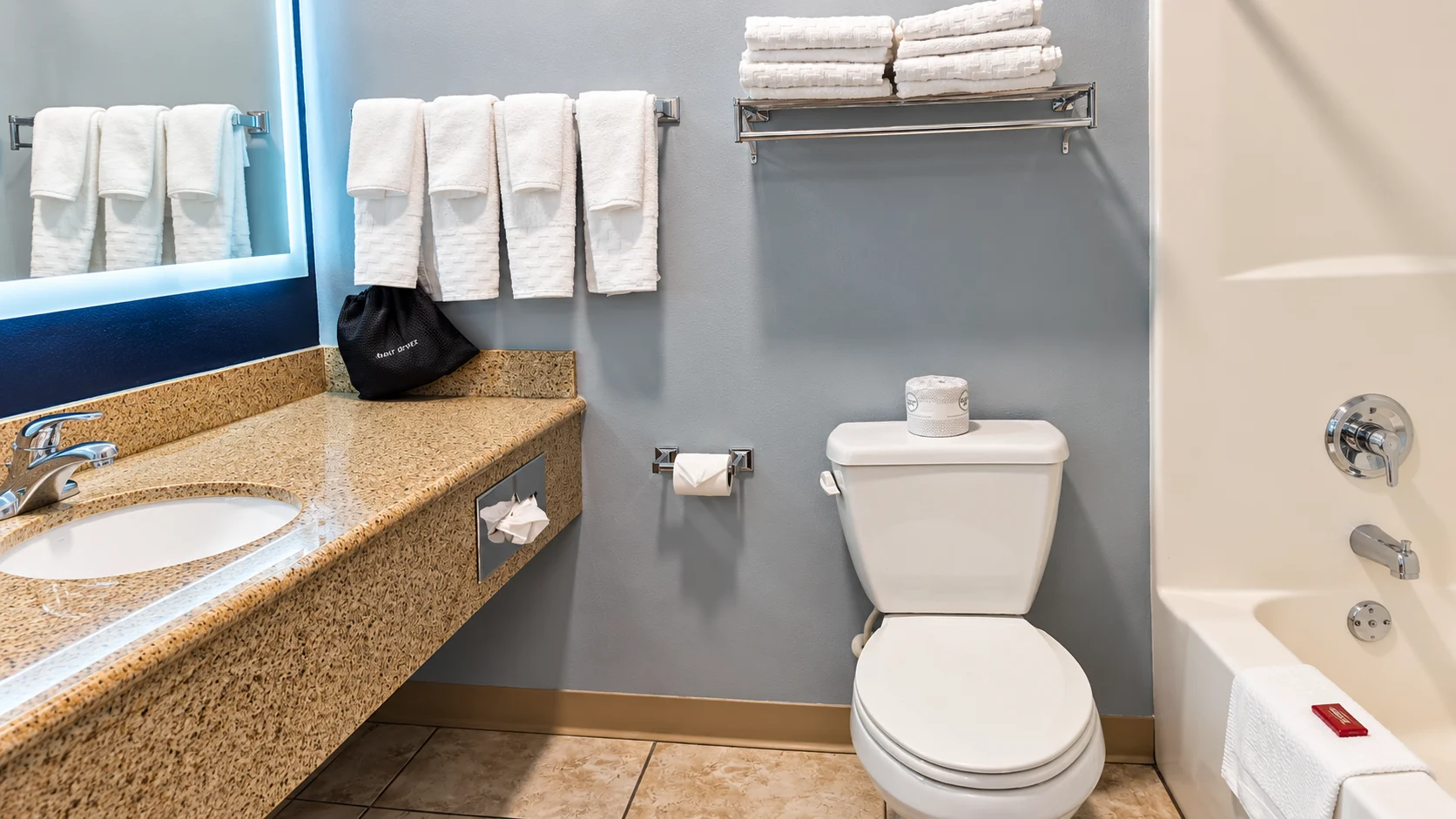 Guest bathroom with vanity, toilet and towel racks — Best Western Vernal Inn, Vernal Utah
