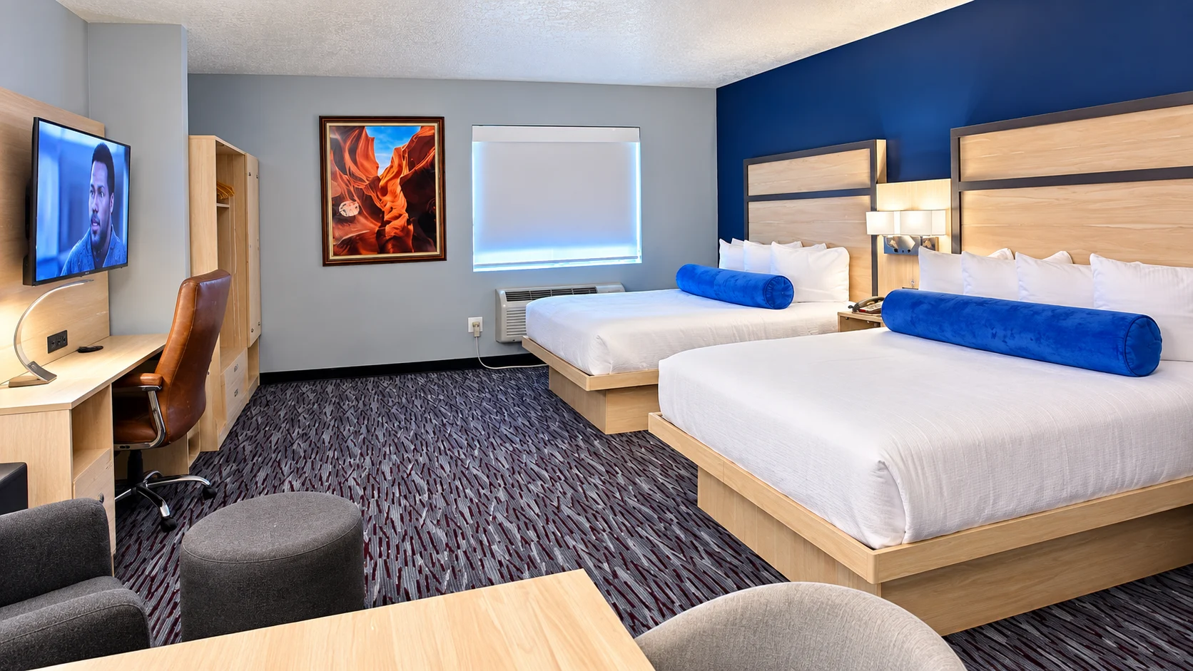 Studio Two Queen seen from the dining table, with desk, TV, closet, window and two queen beds — Best Western Vernal Inn, Vernal Utah