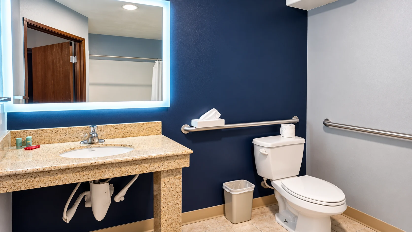 Roll-under bathroom vanity and grab bar in an accessible hotel bathroom — Best Western Vernal Inn, Vernal Utah