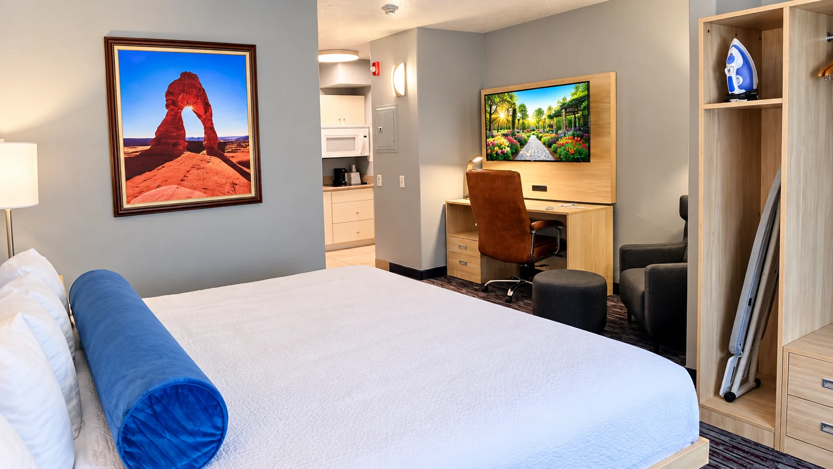 Studio room showing kitchenette, desk, TV and closet — Best Western Vernal Inn, Vernal Utah