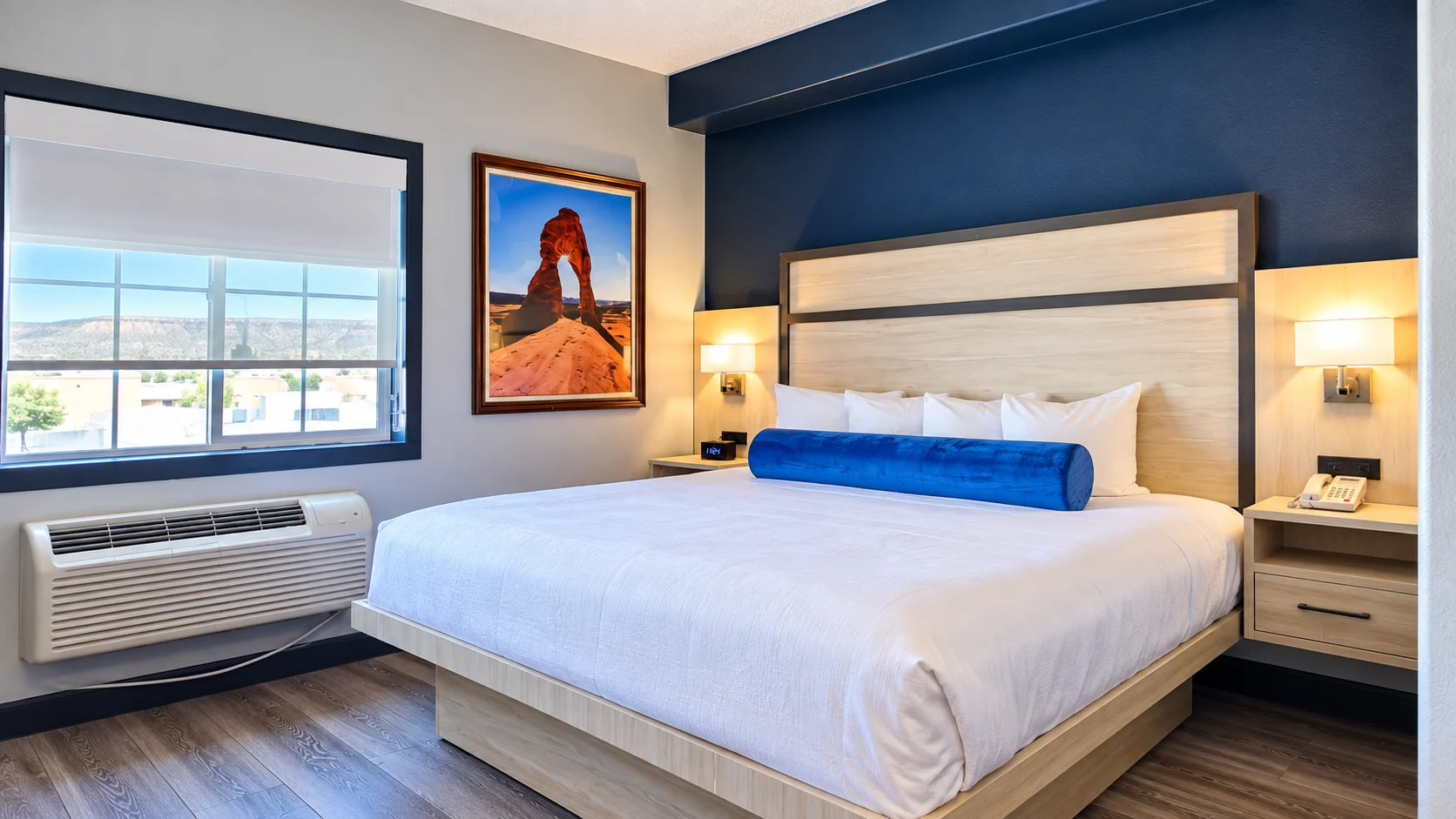 King bed beside a window with a view over Vernal — Best Western Vernal Inn, Vernal Utah